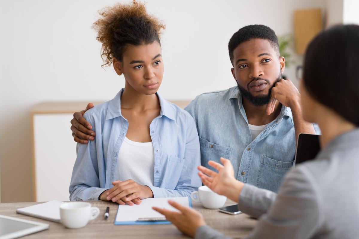 a young woman creates a relapse prevention plan with professional help