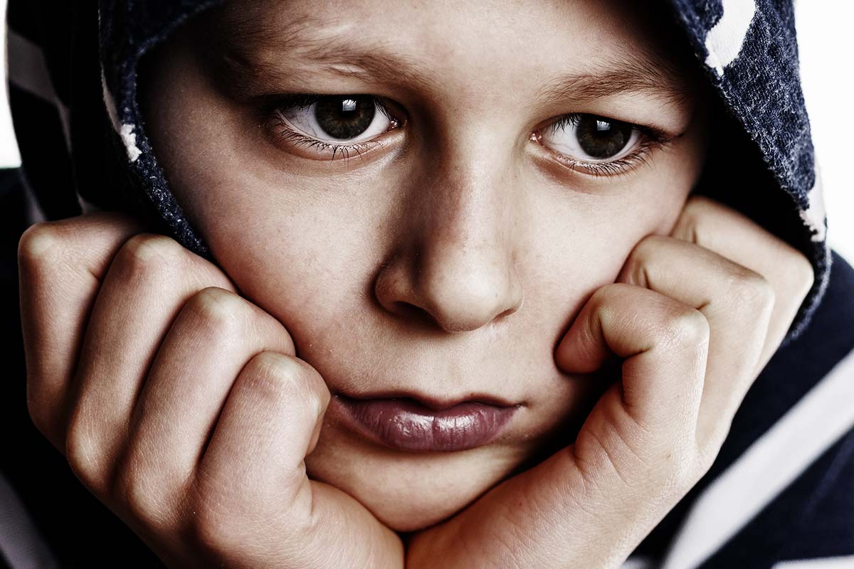 child showing the connection between troubled teens and addiction