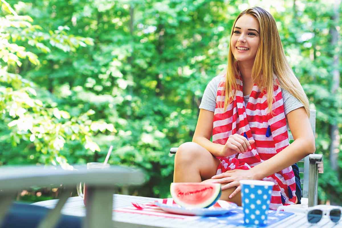 a woman is happy to be living a sober lifestyle