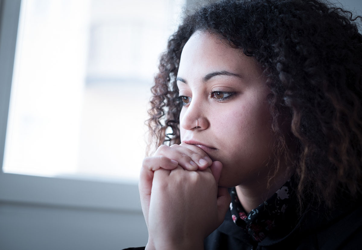 woman struggles with how to heal from trauma