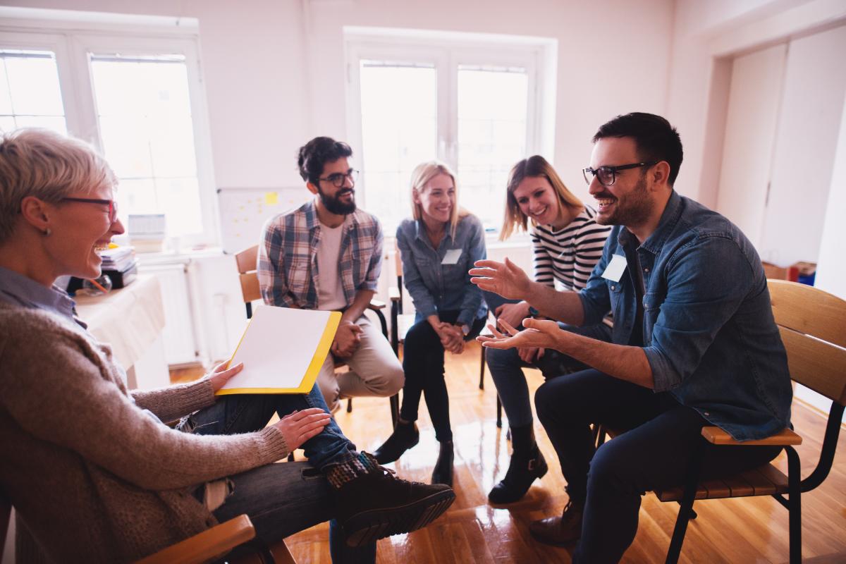 a group of people in a 12-step addiction recovery plan