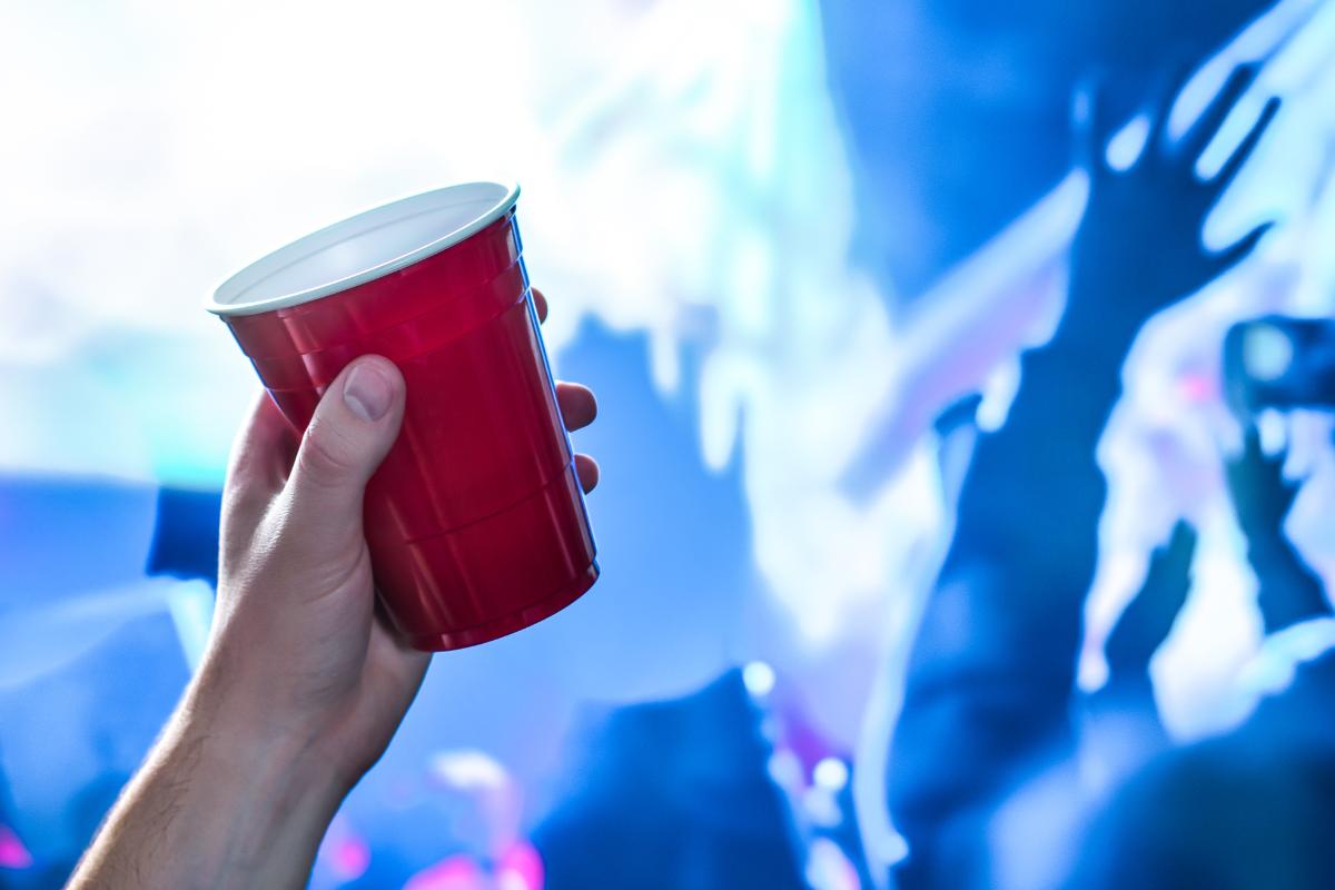 hand-holding-red-cup-as-a-sign-of-teen-alcohol-abuse