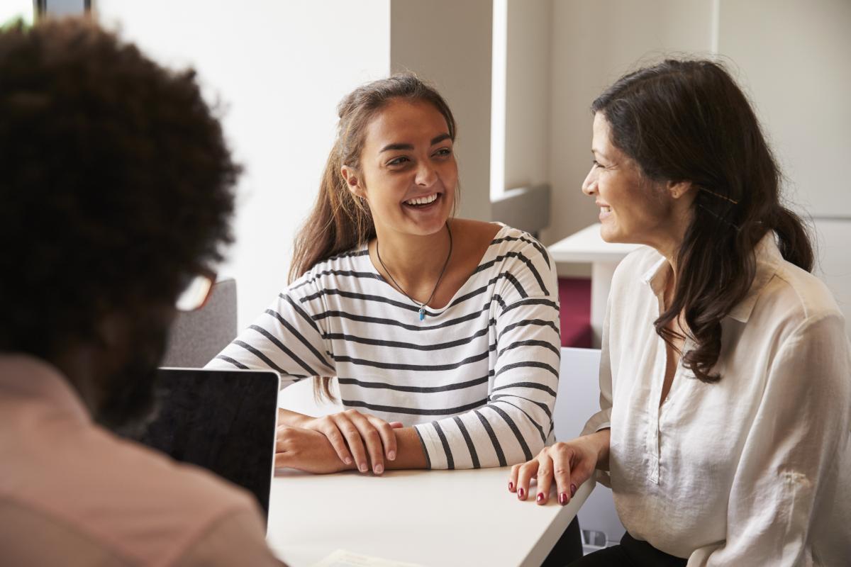 a woman helping her daughter through teen addiction withdrawal