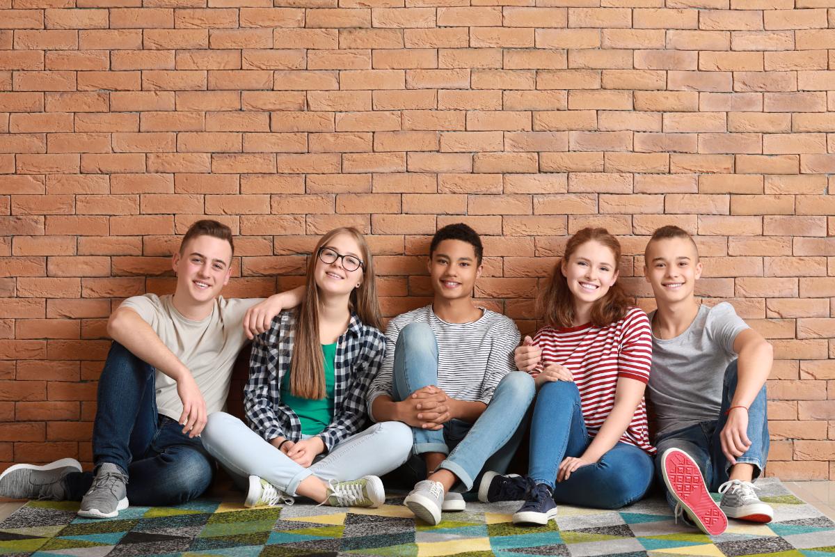 teens-smiling-about-teen-mental-health-therapy-groups