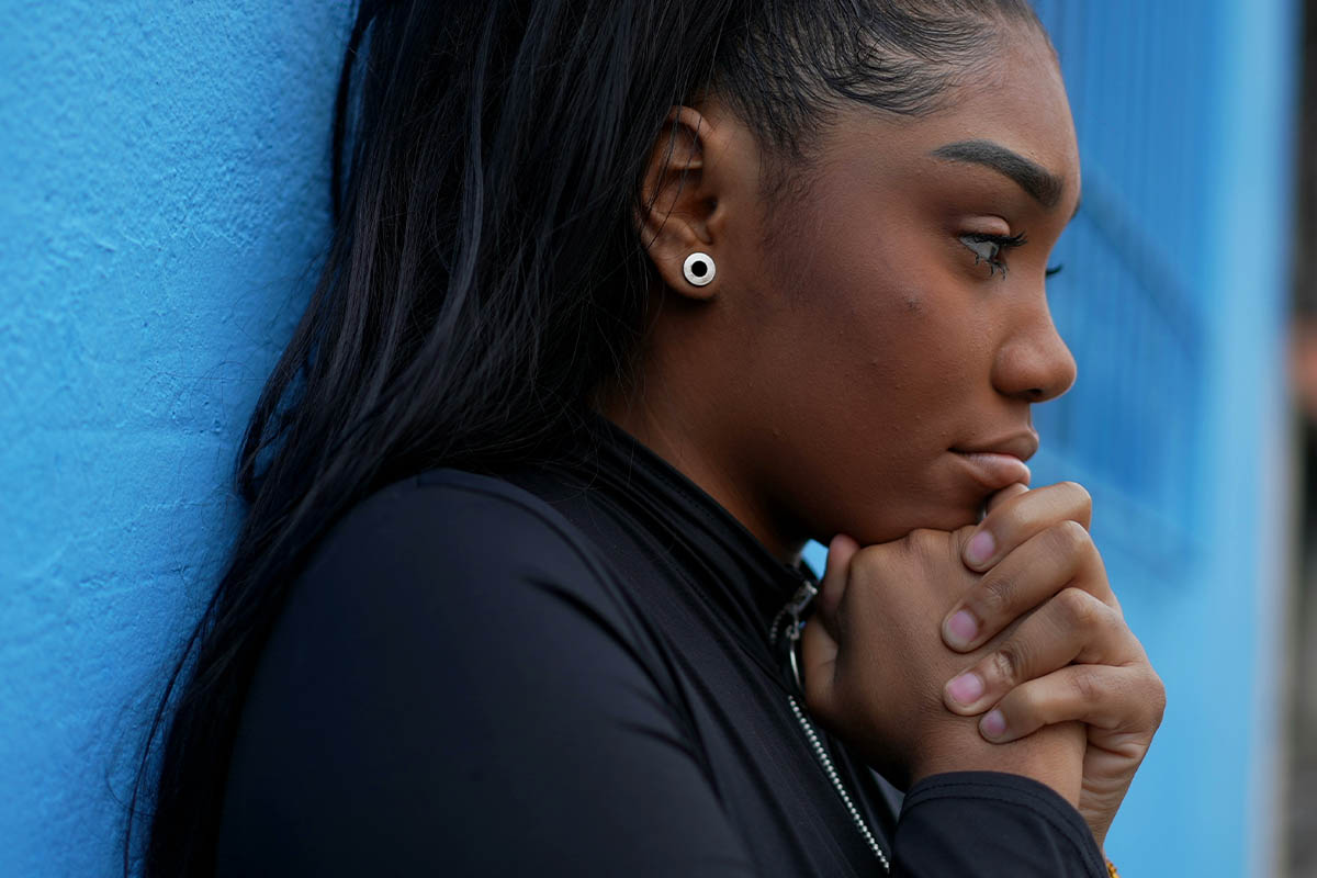 Concerned woman struggling with hydrocodone abuse