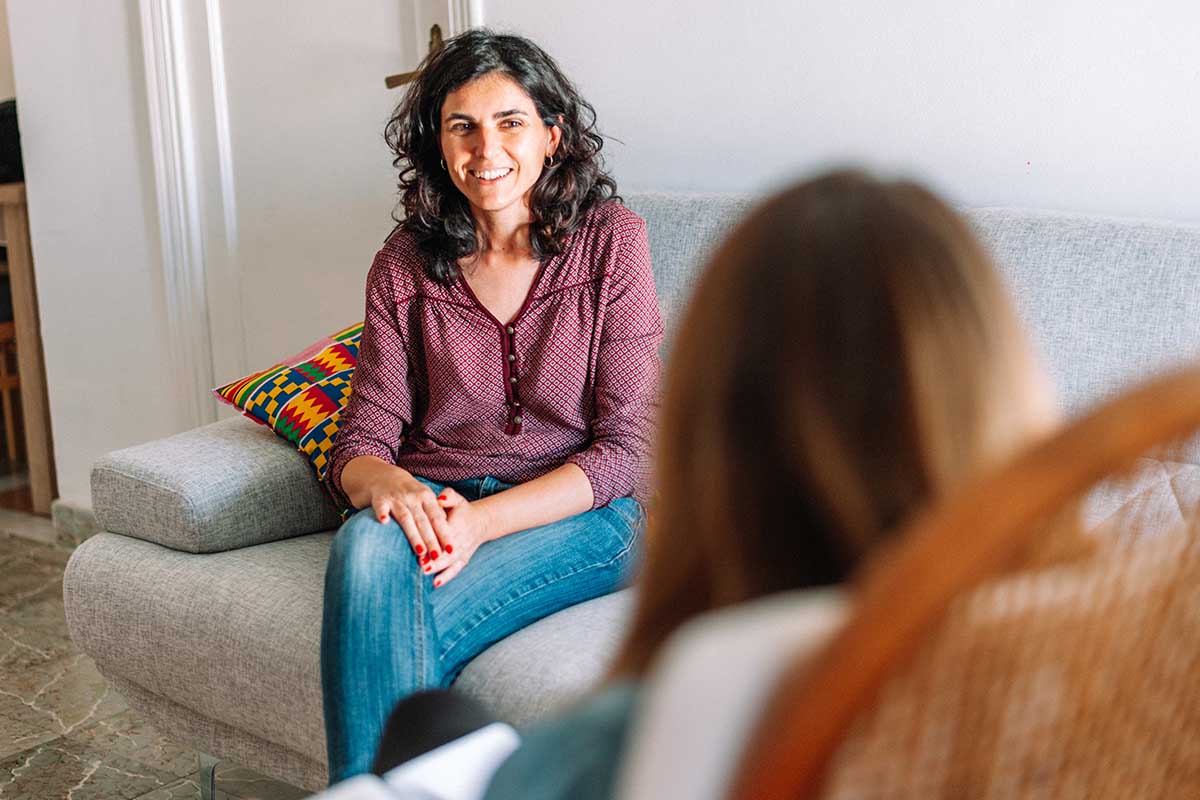 Person learning healthy coping mechanisms in recovery program